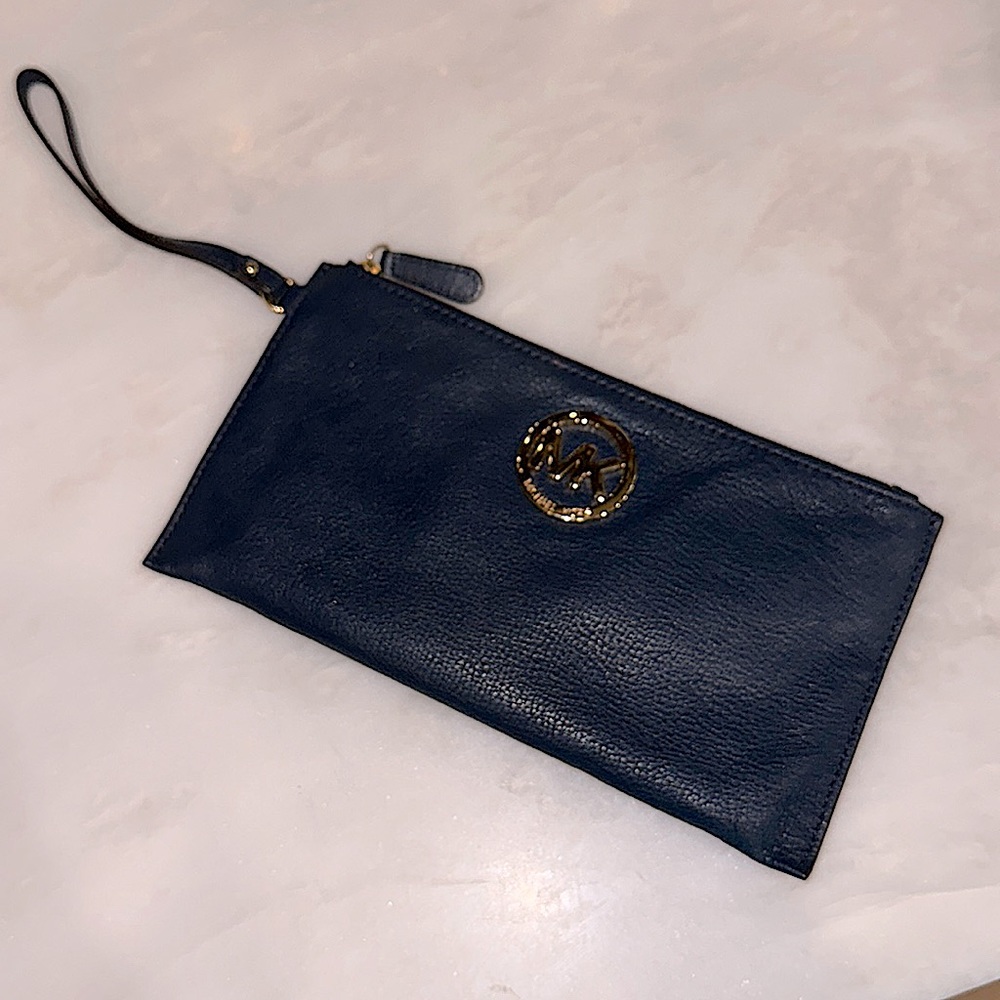 Michael Koran large navy wristlet with gold emblem
